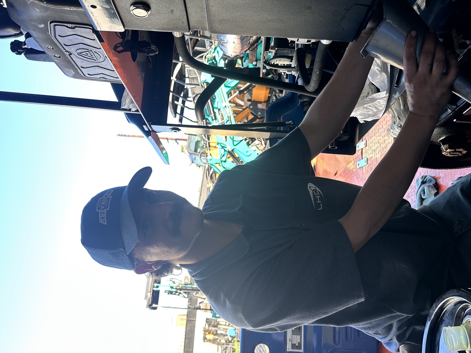 A team member working on a machine