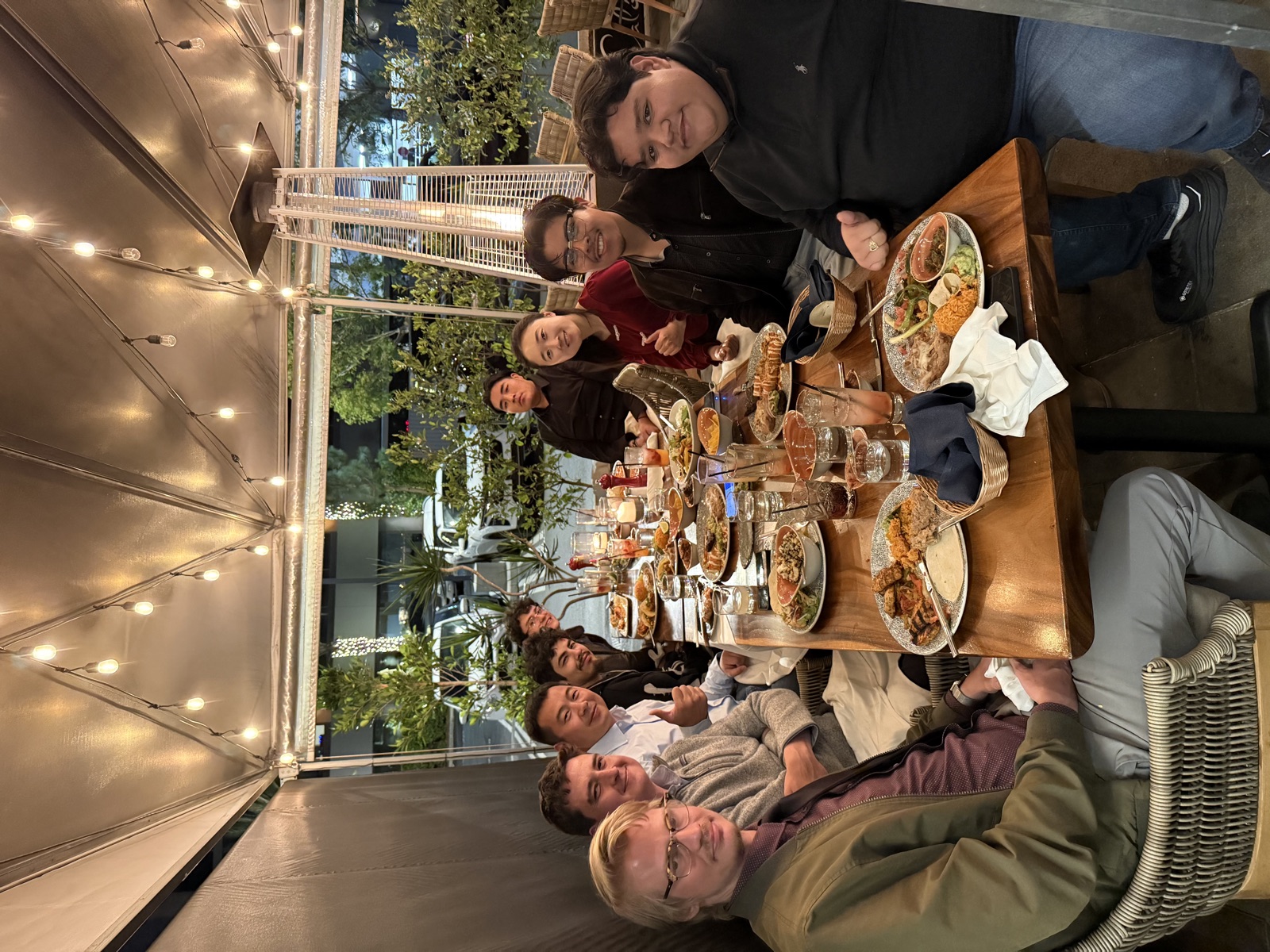 The Leon’s Heavy Equipment team and guests sharing a meal together